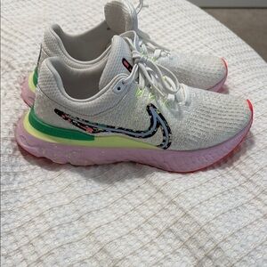 White and Pink Athletic Sneakers